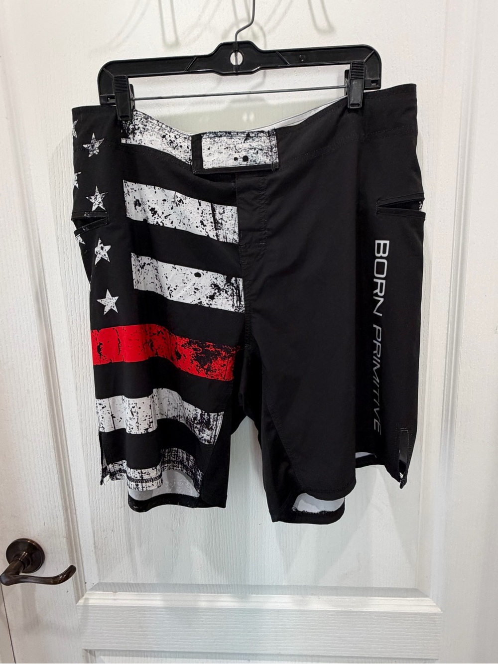 Born Primitive Black Swim Board Shorts with White Stars & Red Stripe